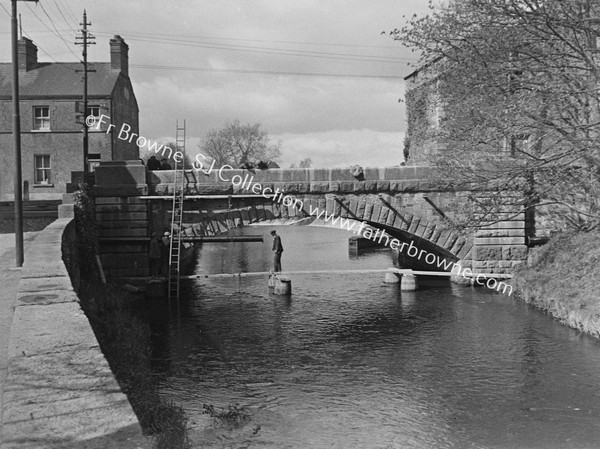 NEW WATER MAIN UNDER BRIDGE